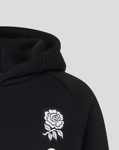 Black hoodie with a white rose design on a light gray background