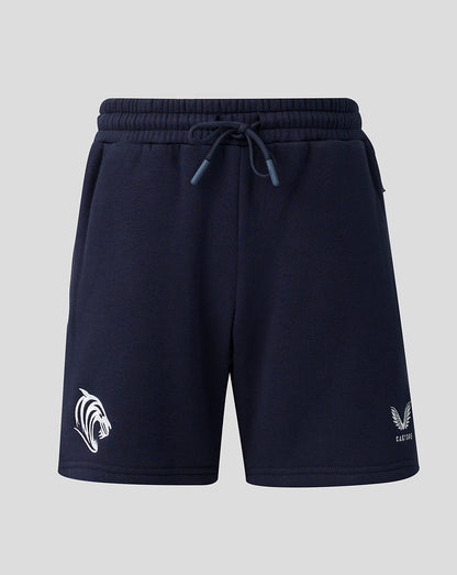 Front view of navy Leicester Tigers travel shorts with a drawstring waist and white logos on the legs.
