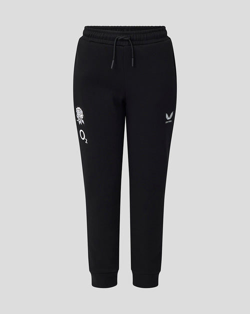 Black jogger pants with white logos on a light gray background