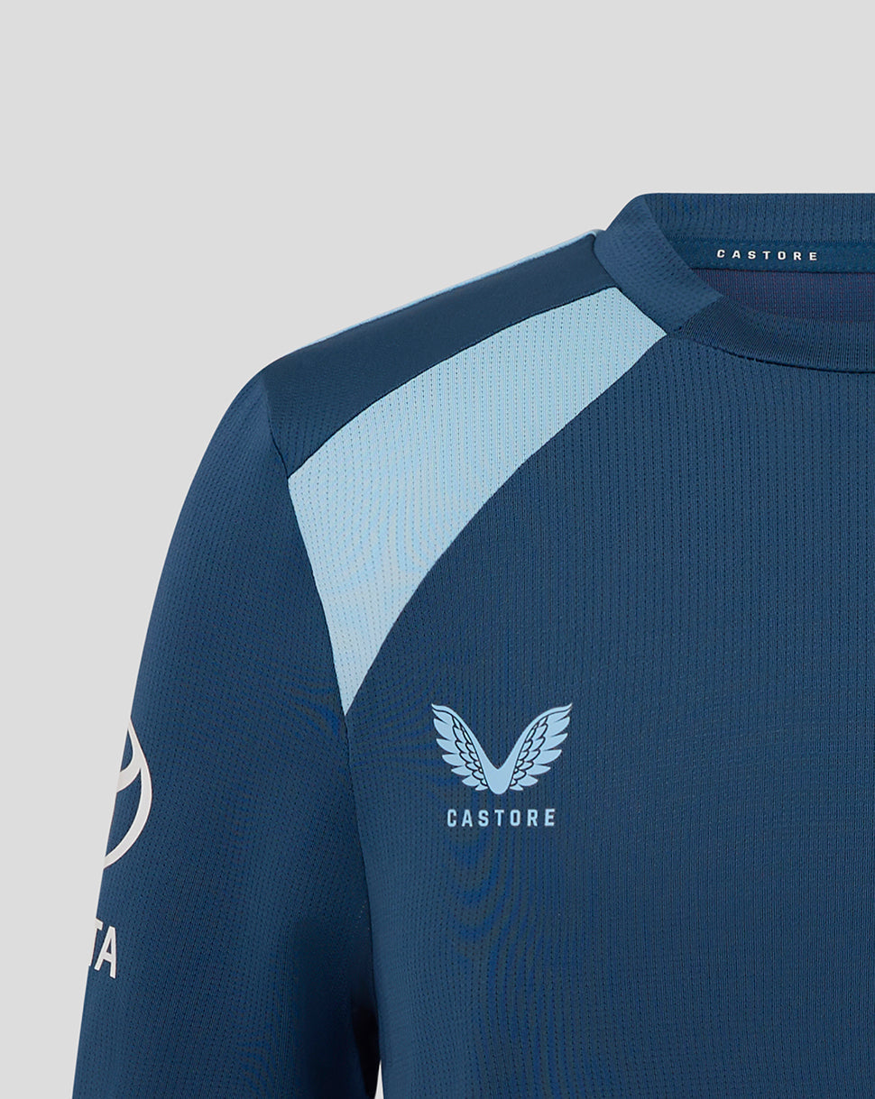 Blue athletic shirt with light blue accents and Castore logo on a gray background
