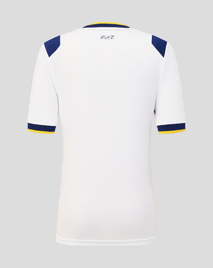 White sports jersey with blue and yellow accents on a light gray background