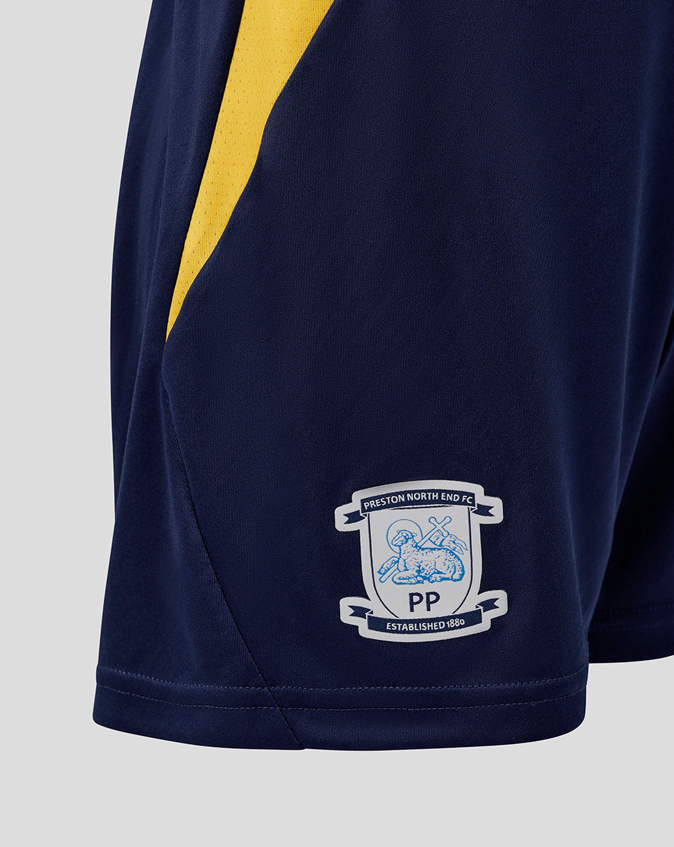Navy sports shorts with yellow stripe and club logo on a light gray background