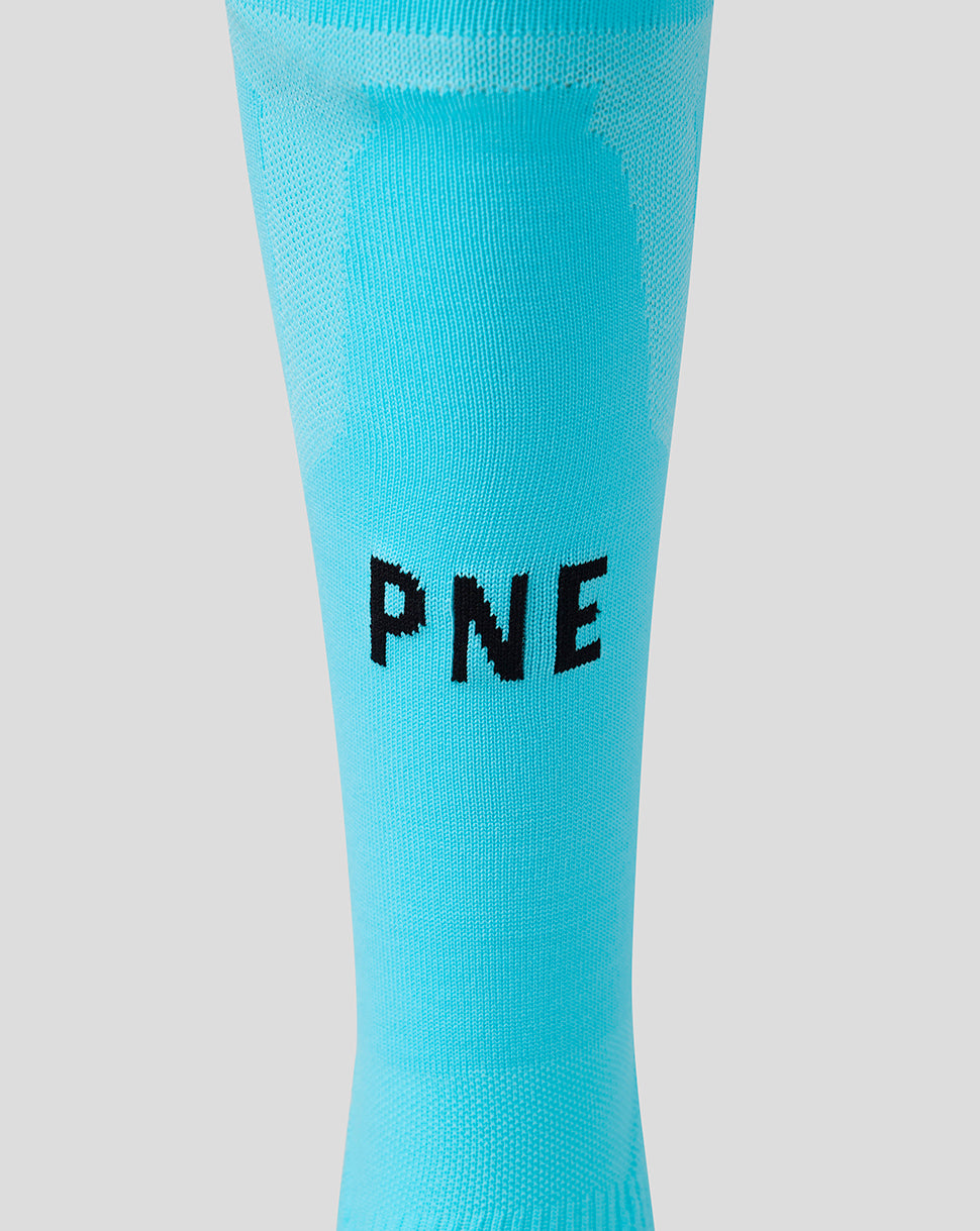 Turquoise sock with 'PNE' text on a light gray background
