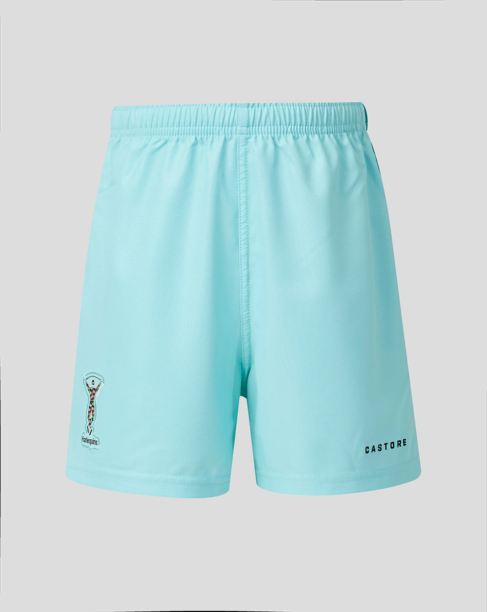 Light blue athletic shorts with an elastic waistband, featuring a small black graphic on the left leg and the word 'CASTORE' printed in black on the right leg, shown against a solid gray background.