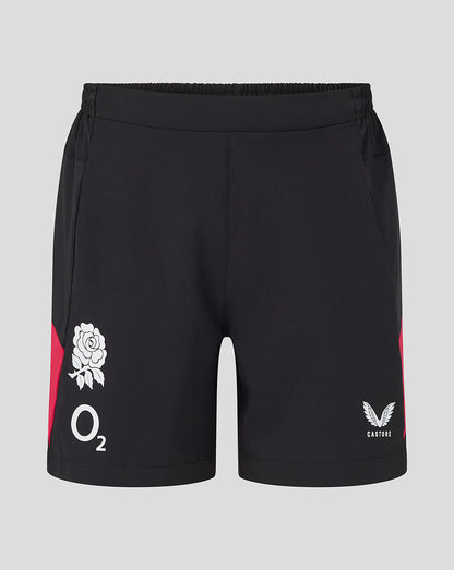 Black shorts with logos on a gray background