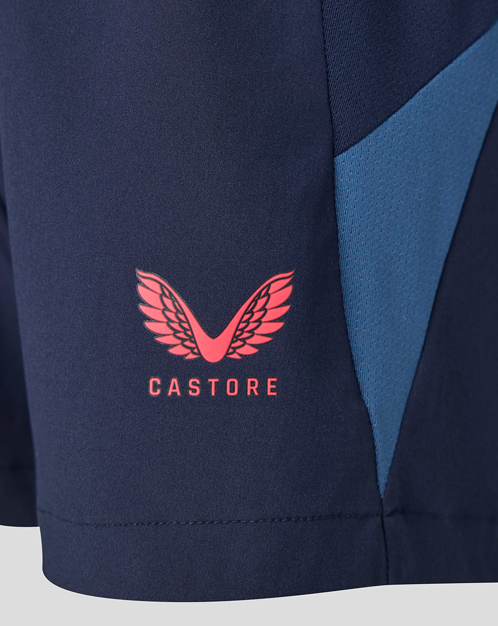Navy blue sports jacket with pink logo and 'Castore' text on a white background