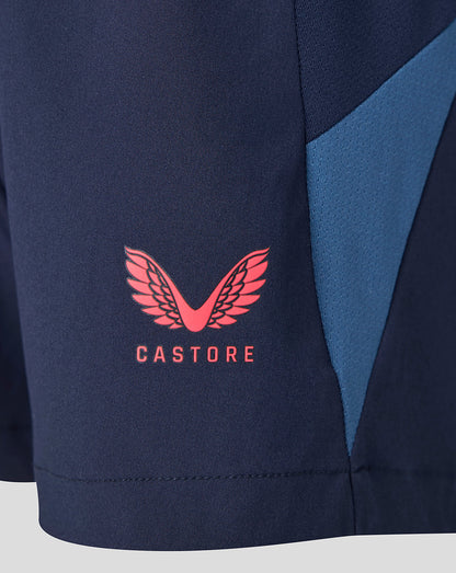 Navy blue sports jacket with pink logo and 'Castore' text on a white background