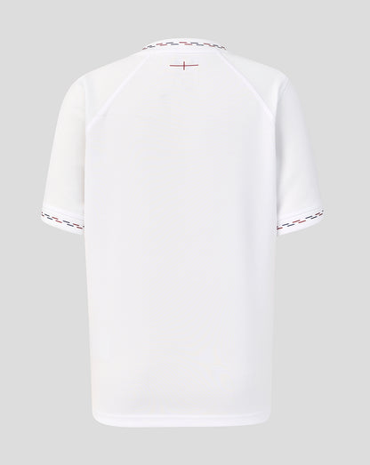 White t-shirt with red and black design on a gray background