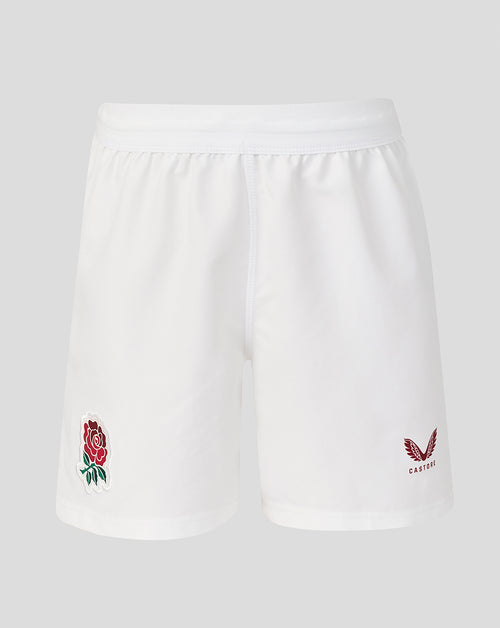 White shorts with embroidered rose and eagle design on a light gray background