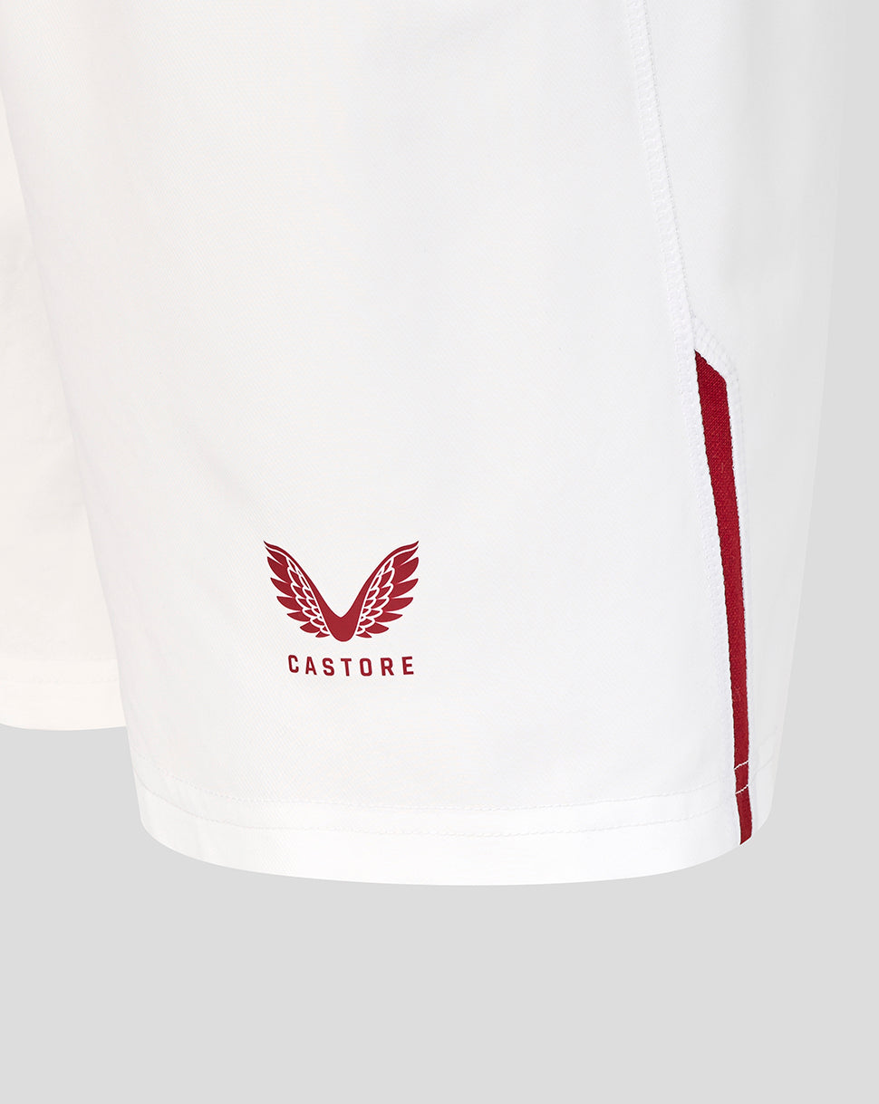 White shorts with red accents and 'Castore' logo on a light gray background