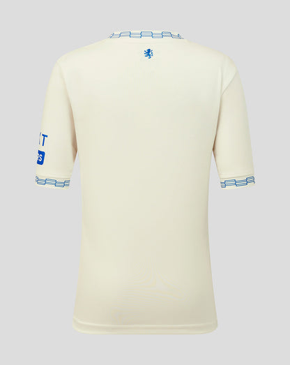 Beige sports jersey with blue accents on a light gray background