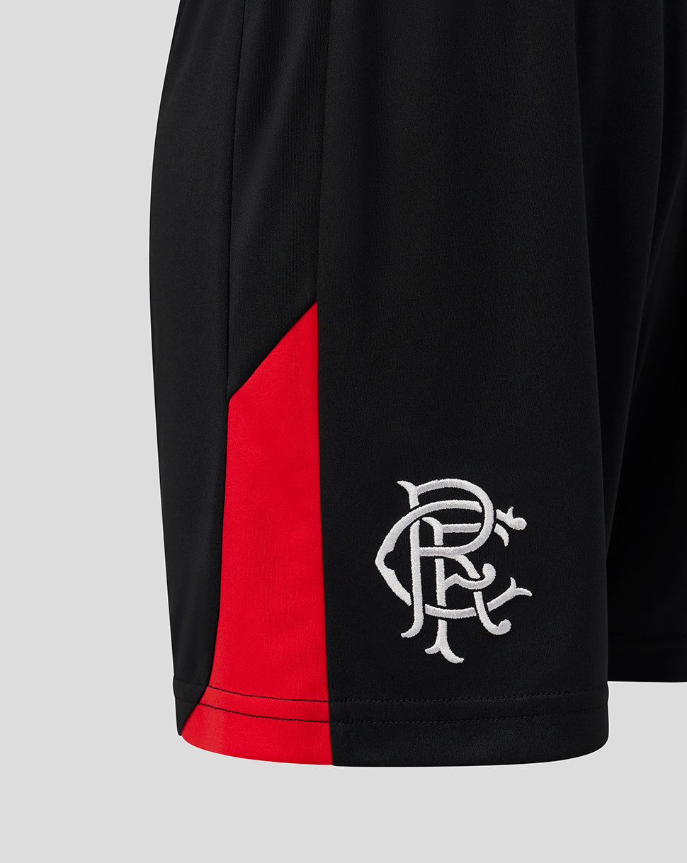 Close-up of black athletic shorts with a red side panel and a white embroidered Rangers crest logo near the hem, shown on a light gray background.