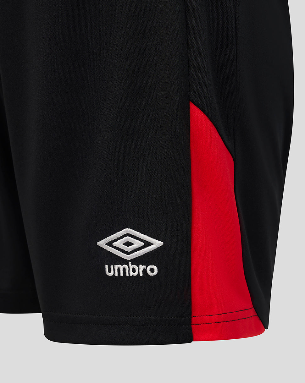 Black shorts with a red section and Umbro logo on a light gray background
