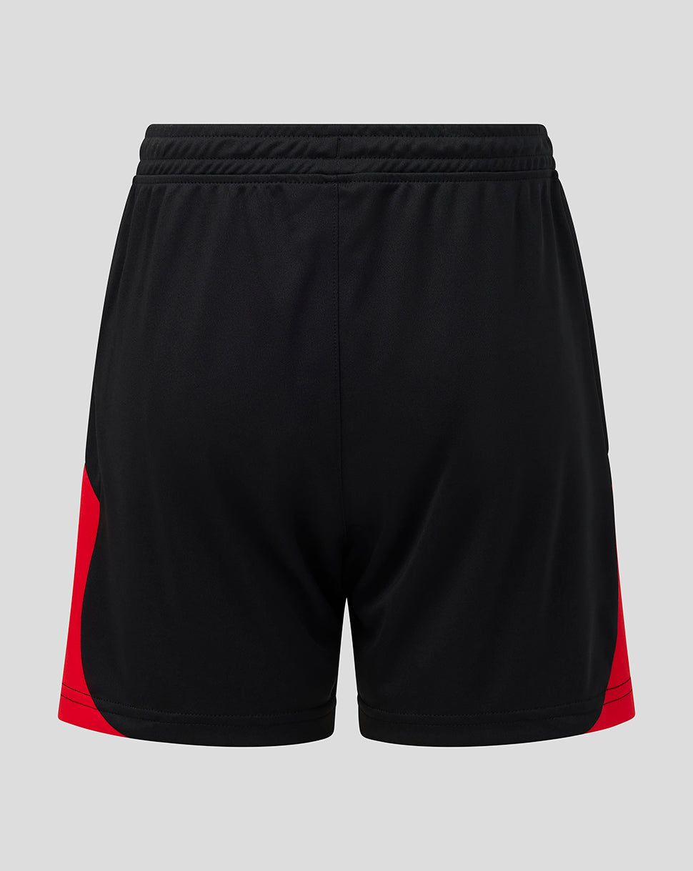 Black athletic shorts with red side panels, shown from the back on a light gray background.