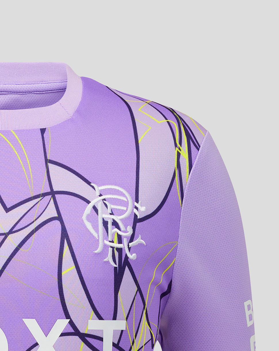 Close-up of a purple athletic jersey with a white stylized Rangers logo on the chest, abstract black and yellow line graphics, and a light gray background.