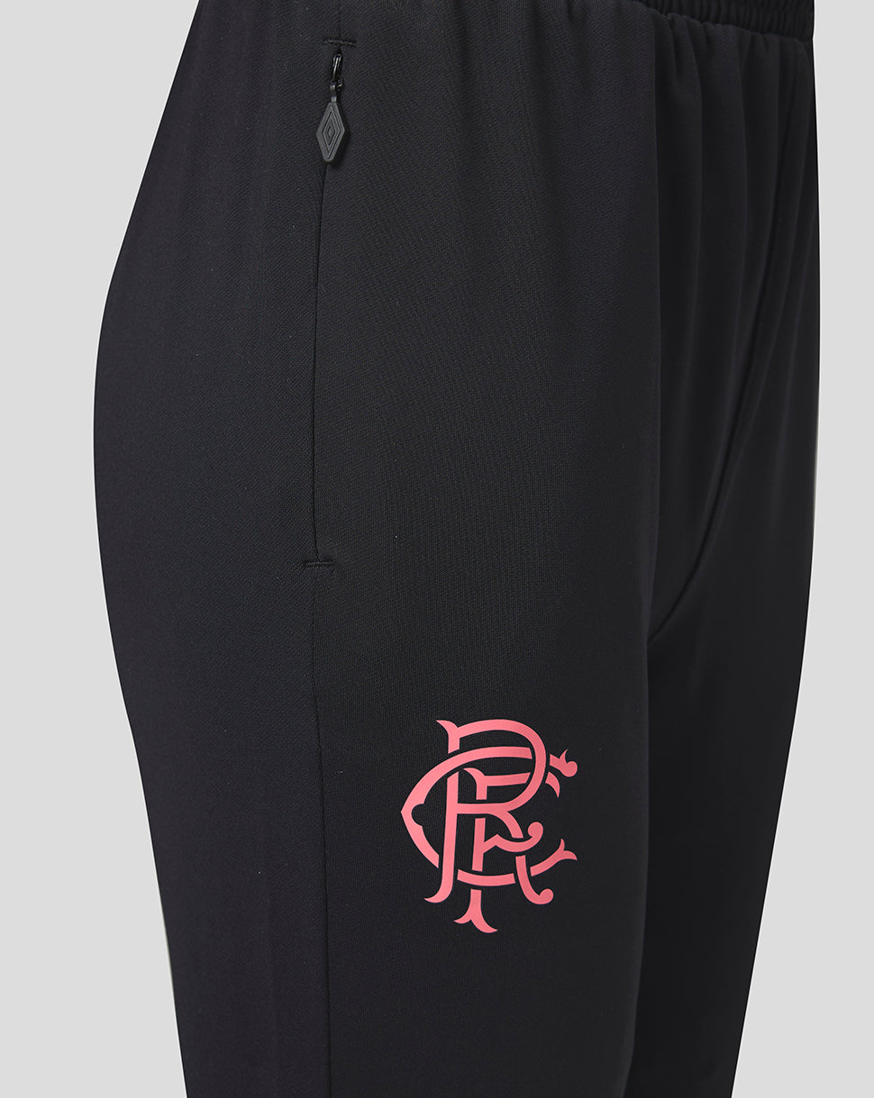 Black pants with a red logo on a light gray background