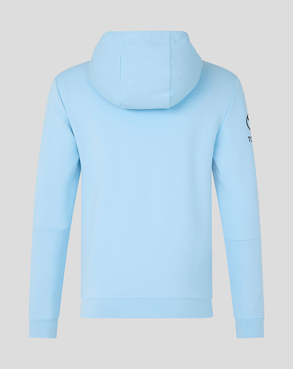 Light blue hoodie with a brand logo on the sleeve against a light gray background