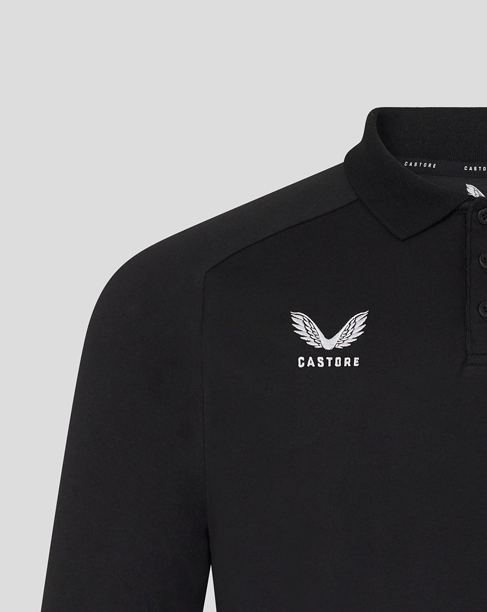 Black polo shirt with white logo and text on a light gray background