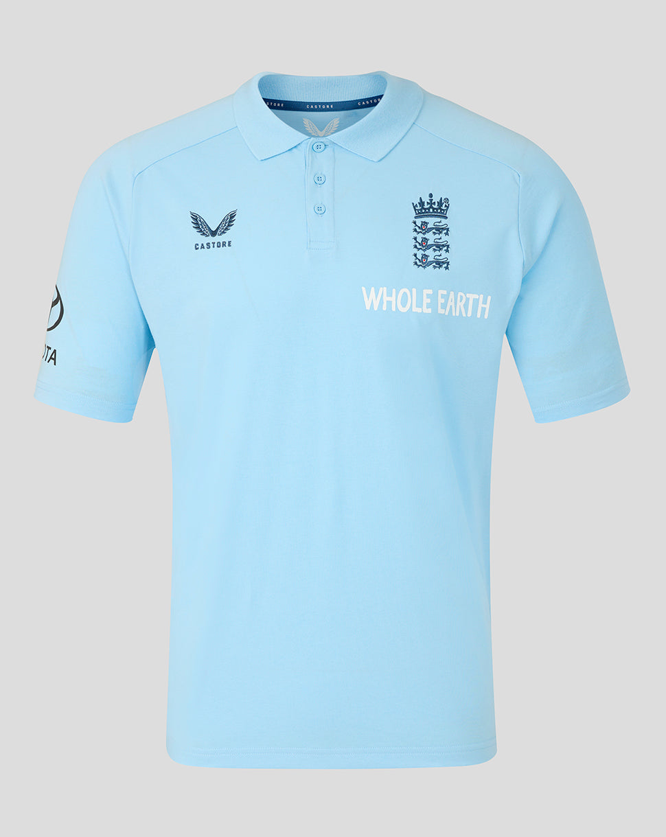 Light blue polo shirt with multiple logos on a light gray background