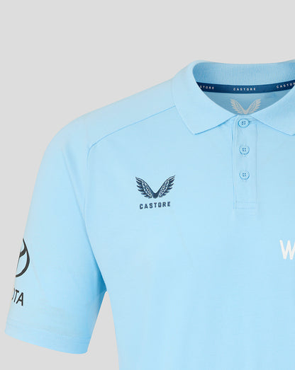 Light blue polo shirt with branding on a light gray background