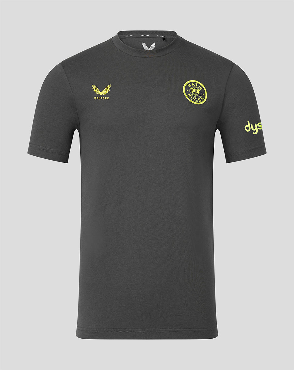 Bath Rugby travel T shirt in dark grey with yellow Castore logo on left chest and Bath Rugby crest on right chest
