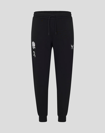 Black jogger pants with white logos on a light gray background