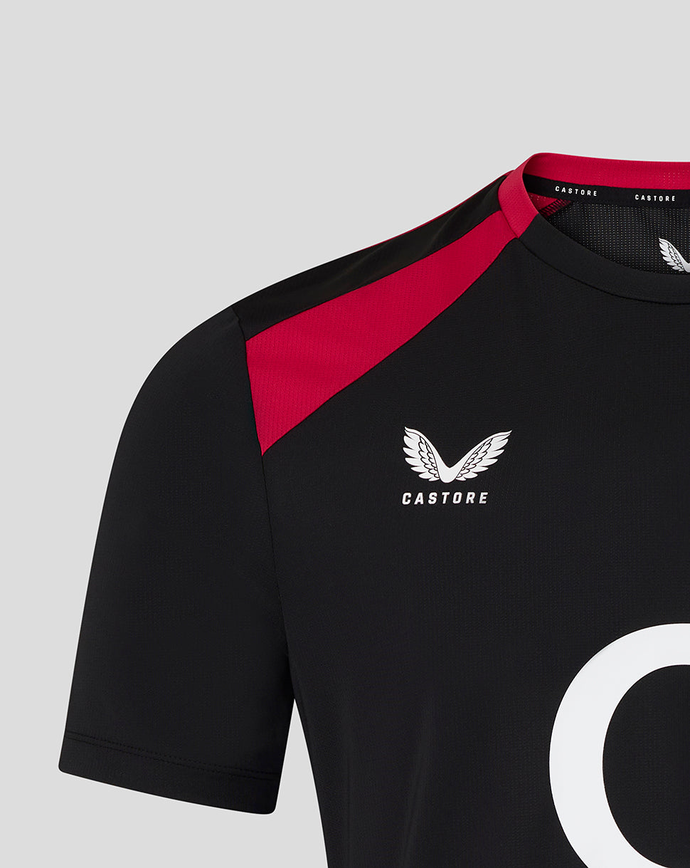 Black sports jersey with red accents and Castore logo on a gray background