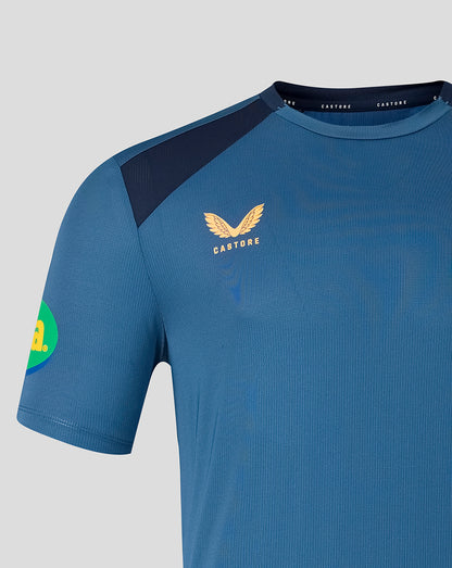 Front view of blue Leicester Tigers training T shirt with gold crest and Castore branding on the chest and dark shoulder panel.