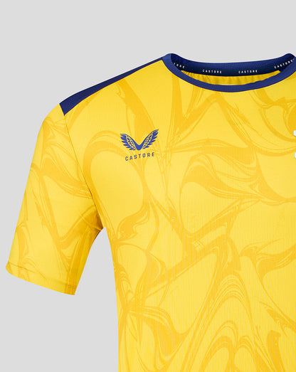 Yellow sports jersey with blue accents and a logo on a gray background