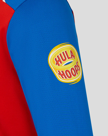 Close-up of a blue and red sleeve with a Hula Hoops logo on a white background