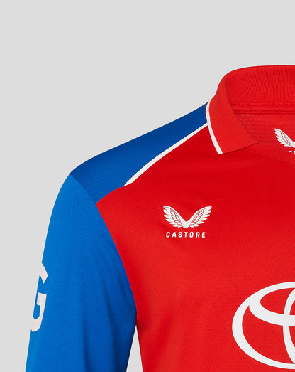 Red and blue sports jersey with Castore and Toyota logos on a gray background