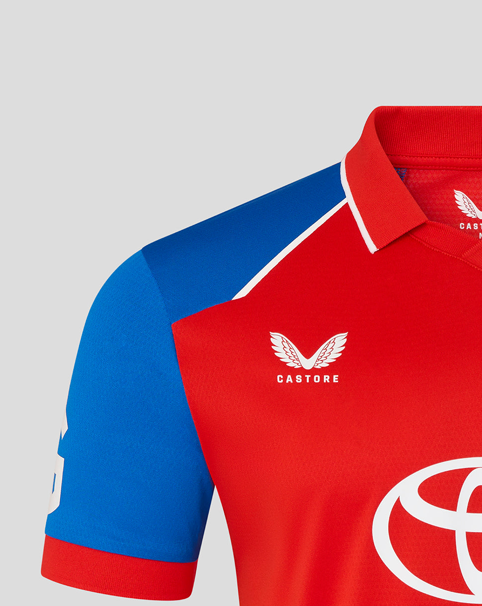 Red and blue sports jersey with Castore and Toyota logos on a gray background