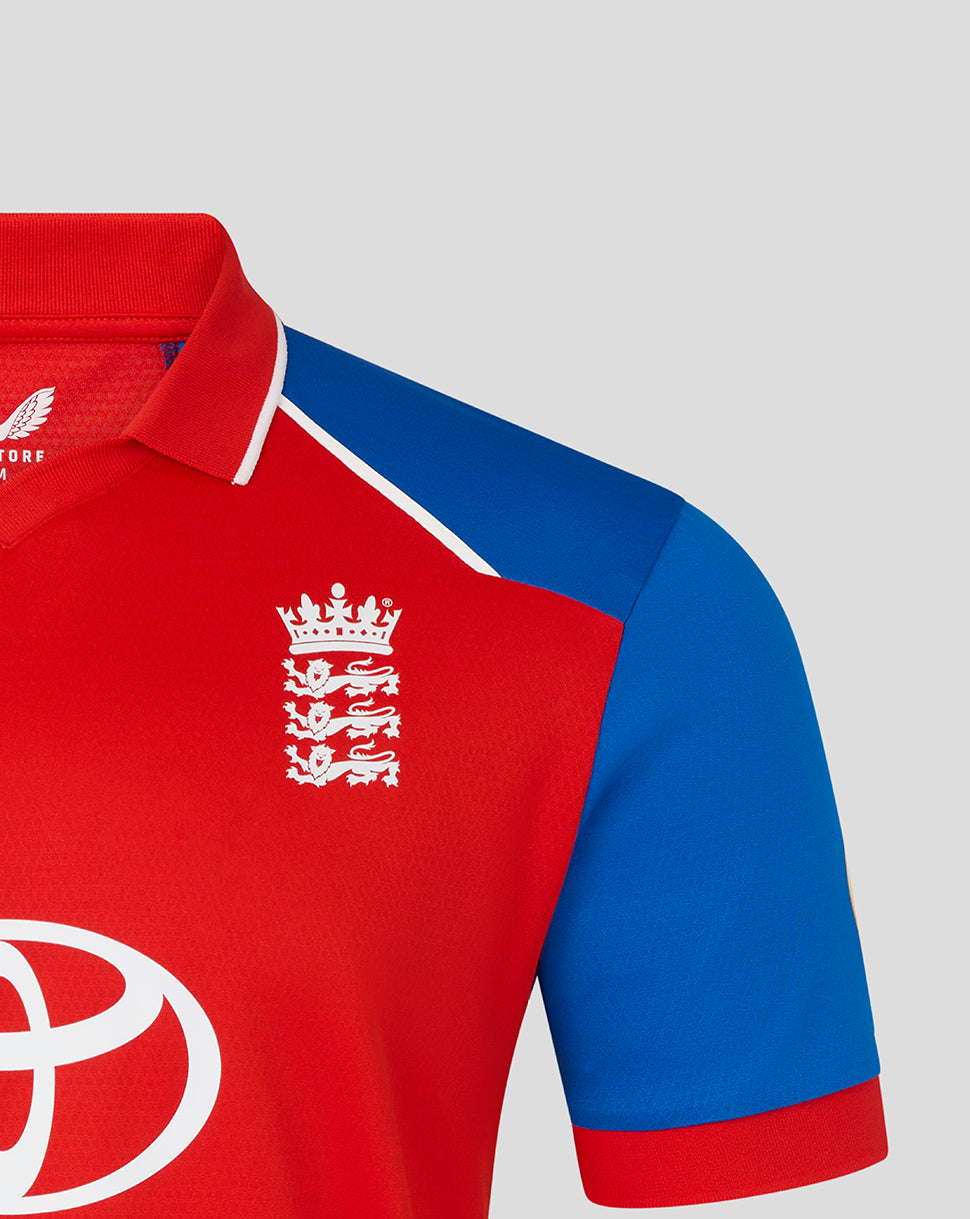 Red and blue sports jersey with a logo on a gray background