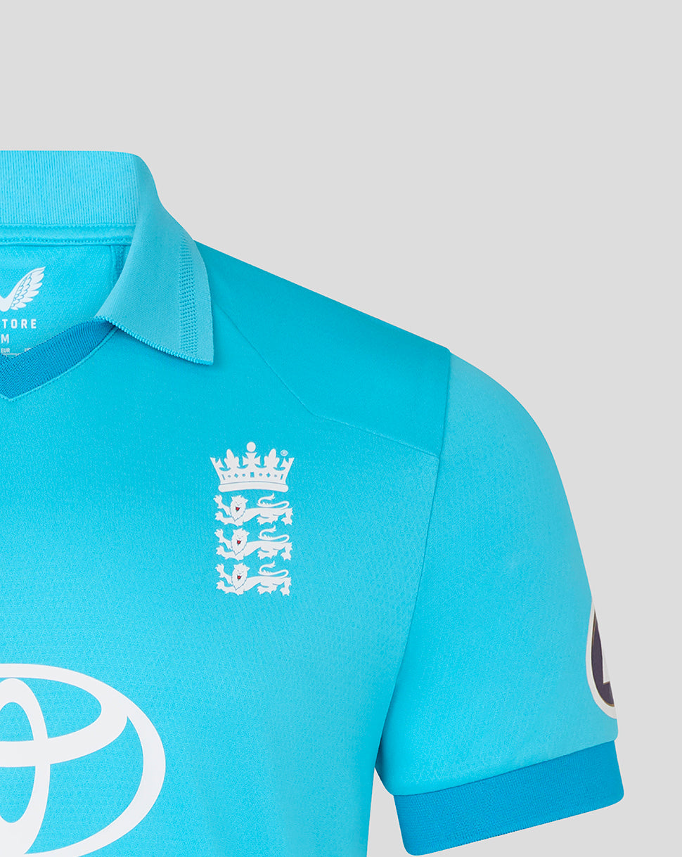Blue polo shirt with a logo on a light gray background