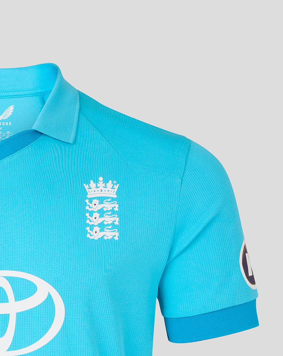 Blue polo shirt with a white logo on a light gray background