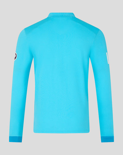 Blue long-sleeve shirt on a light gray background