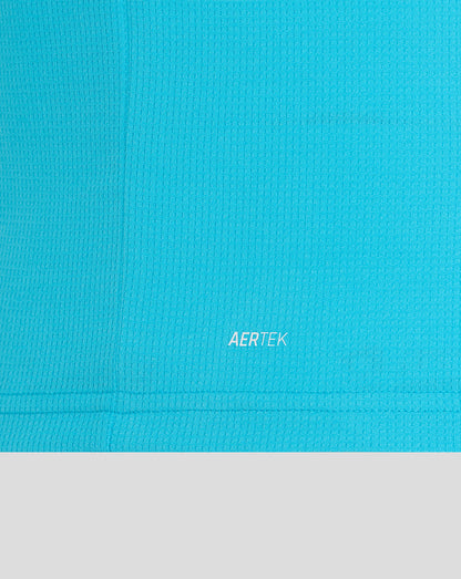 Close-up of a blue textured fabric with 'AERTEK' branding.