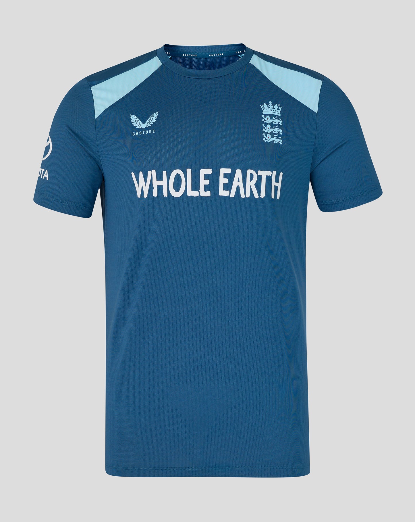 Blue sports jersey with 'Whole Earth' branding on a gray background