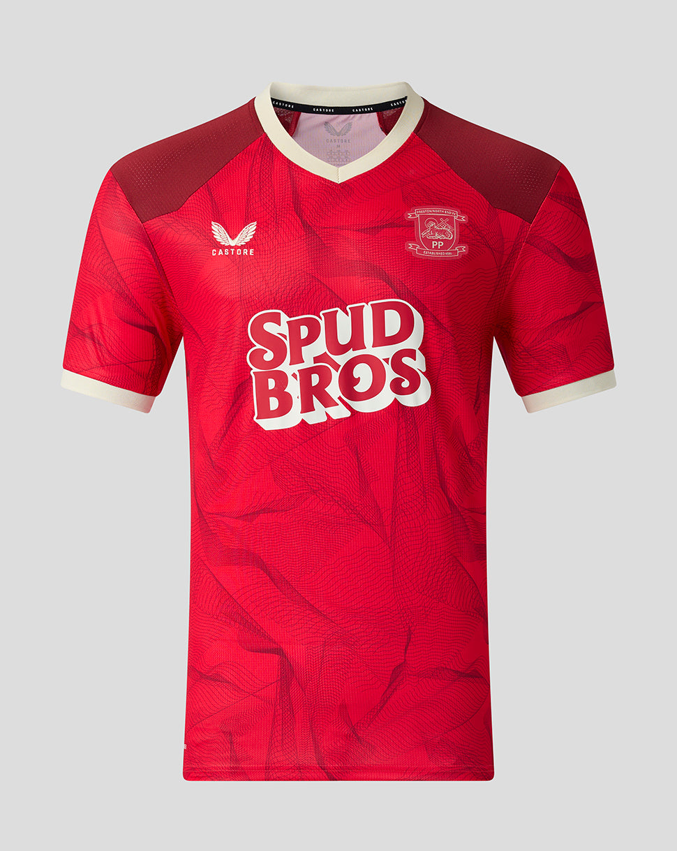 A red short-sleeve soccer jersey with a subtle tonal pattern, featuring a white and red 'SPUD BROS' sponsor logo on the chest, a white Castore logo underneath, and the PNE club crest on the opposite chest. The jersey has a white V-neck collar and white sleeve cuffs, shown against a solid light gray background.