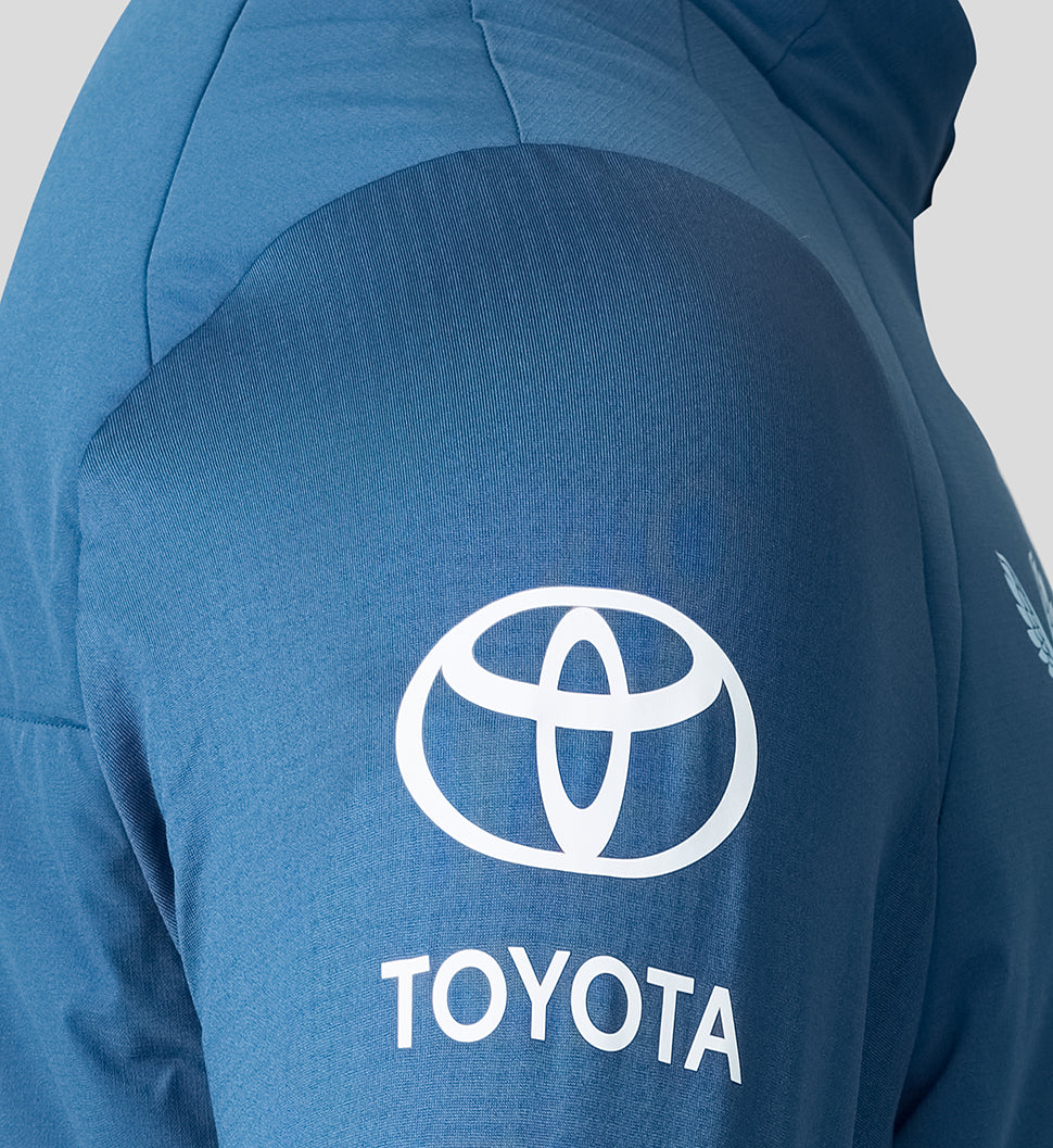 Blue jacket with Toyota logo on the back against a light gray background