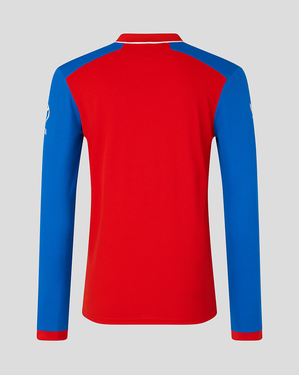 Red and blue long-sleeve shirt on a gray background