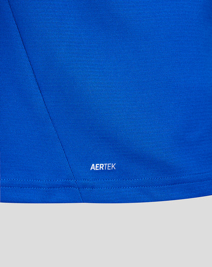 Close-up of a blue fabric with 'AERTEK' branding on a gray background