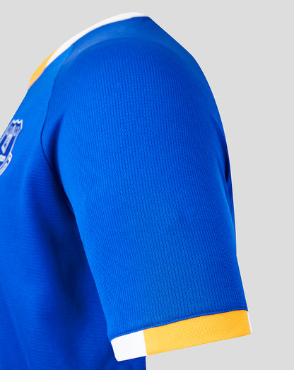 Blue sports jersey with yellow and white accents on a gray background