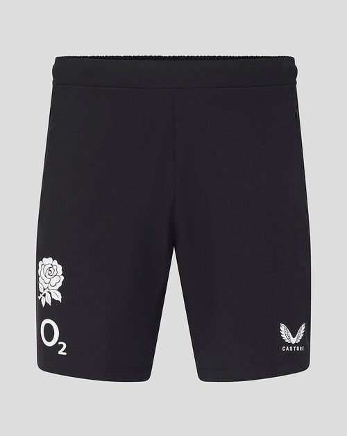 Black shorts with white logos on a gray background