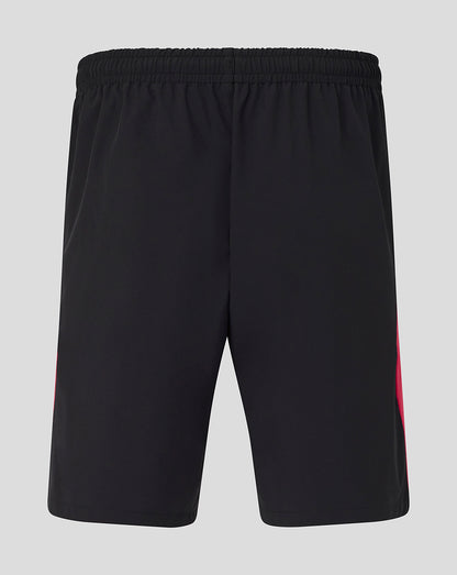 Black shorts with a red stripe on a light gray background