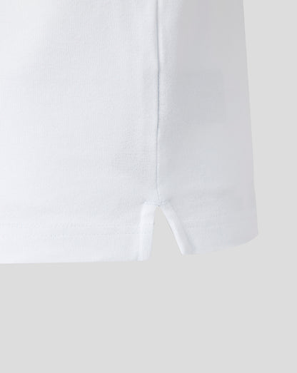 Close-up of a white shirt with a collar on a light gray background