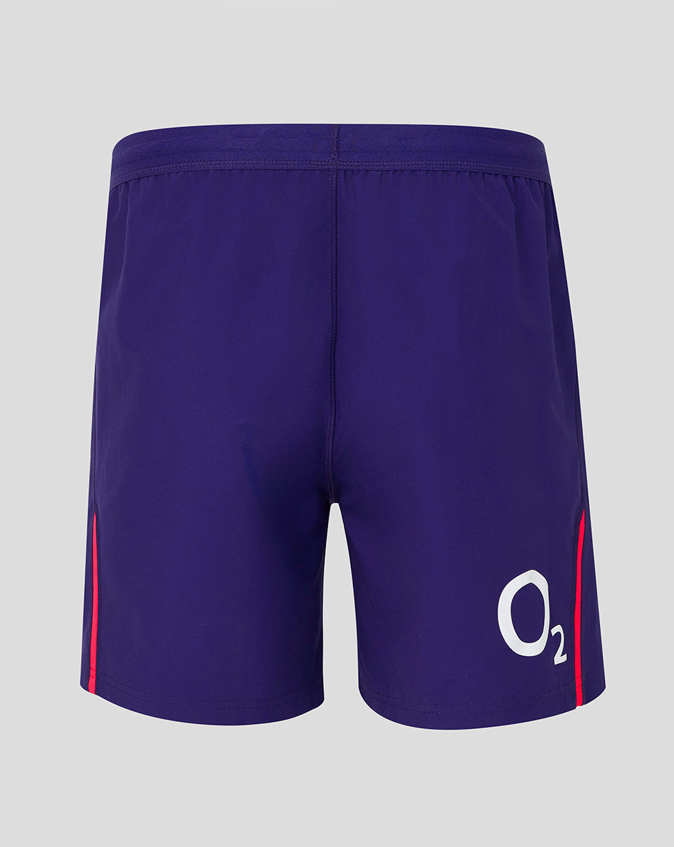 Purple shorts with a logo on a gray background