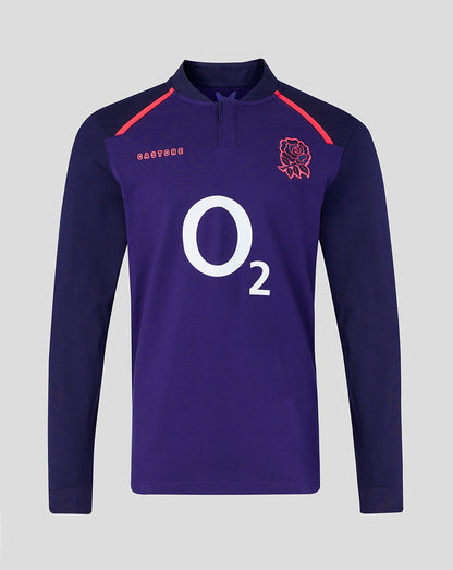 Purple long-sleeve shirt with red accents and branding on a gray background