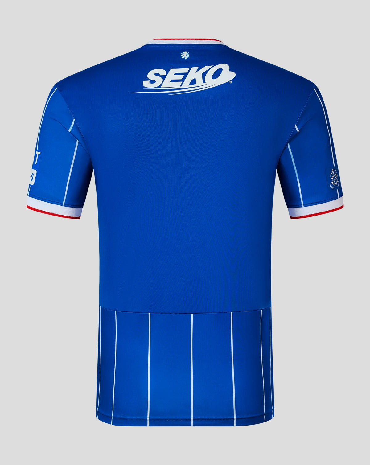 The back of a royal blue short-sleeve athletic jersey with white and red trim, featuring a large white 'SEKO' logo across the upper back and vertical white pinstripes.