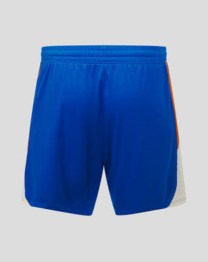 Blue athletic shorts with orange accents on a gray background